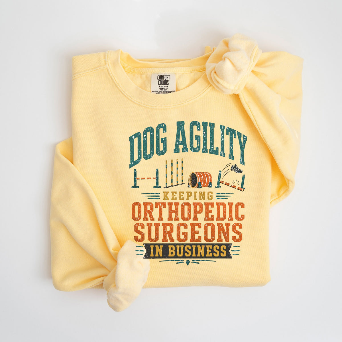 Dog Agility: Keeping Orthopedic Surgeons in Business - Comfort Colors crewneck in Butter