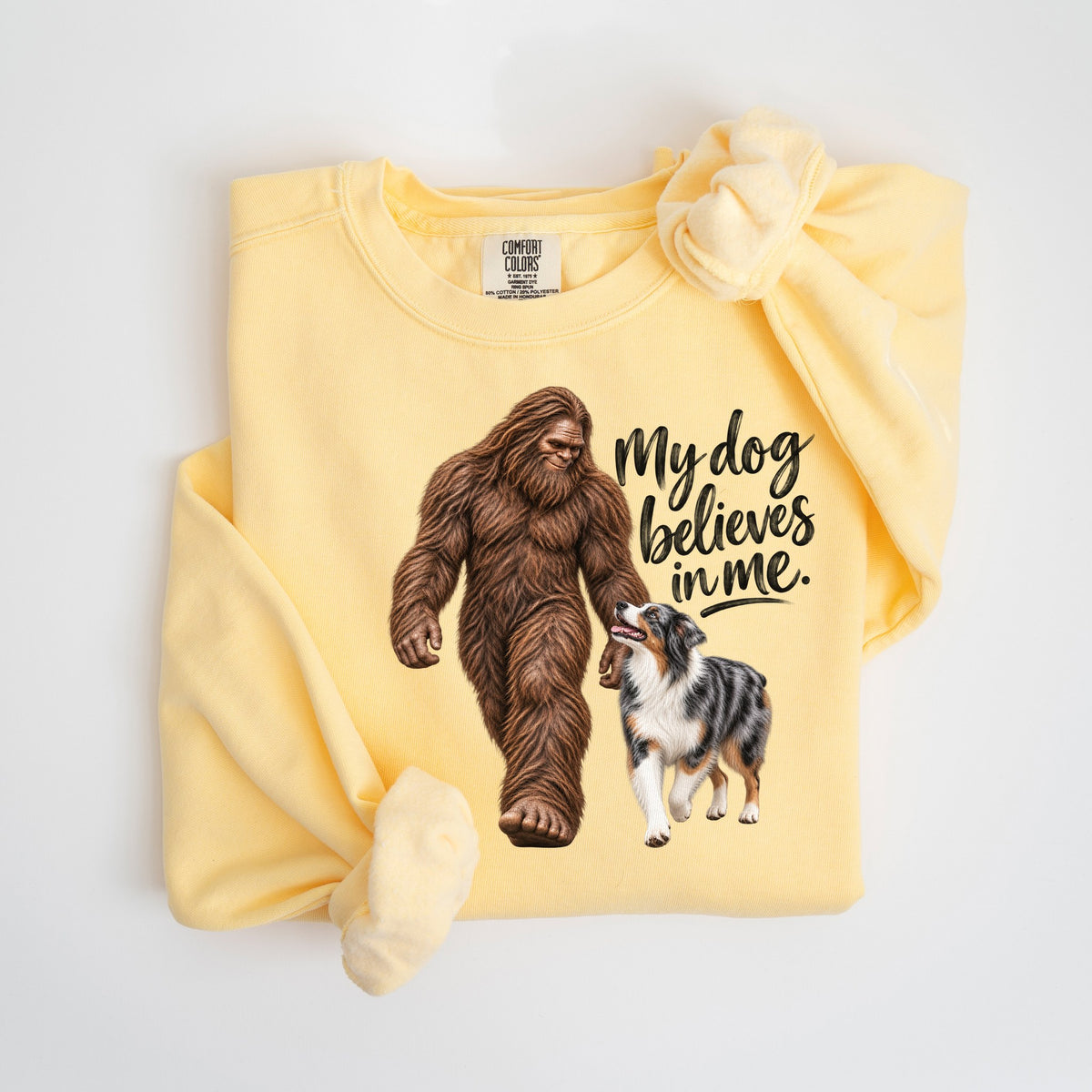 My Dog Believes in Me - Australian Shepherd & Bigfoot - Comfort Colors crewneck in Butter