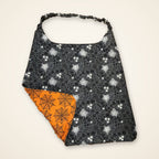 Orange Spiderweb / Gray Webs drool bib, gray web side