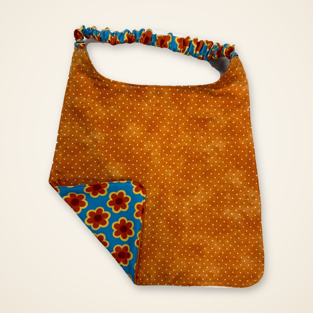 Retro Flowers / Orange Dots drool bib, orange dot side