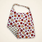 Coral Flowers / Orange Lattice drool bib, flower side
