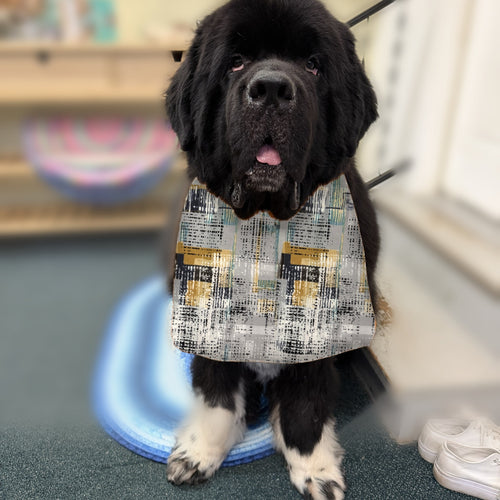 Newfoundland dog wearing the Gray Abstract / Navy Basketweave drool bib