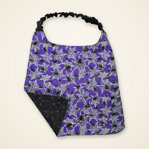 Purple Spiders / Black Stars drool bib, purple spider side