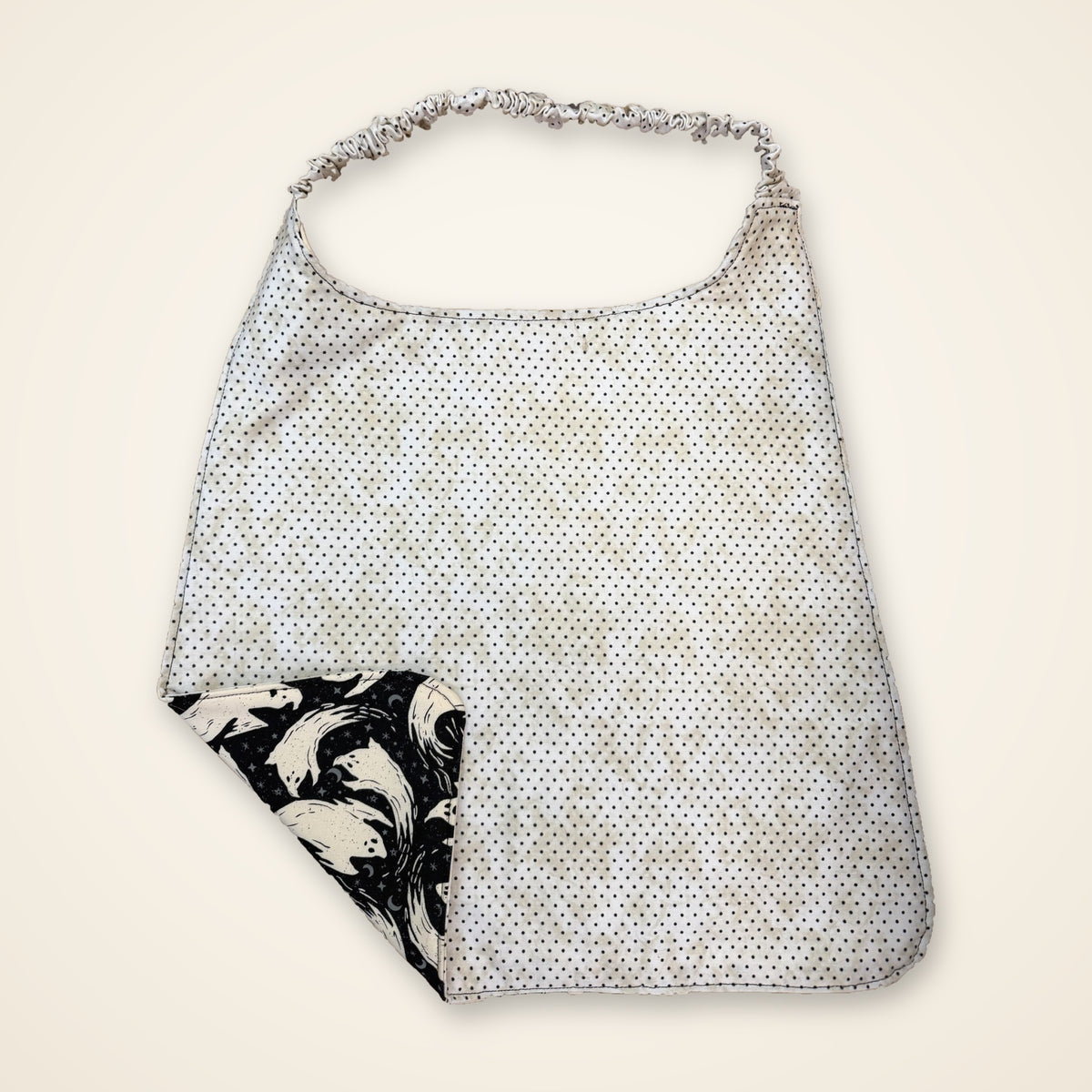 Black Ghosts / Cream Polka Dots drool bib, polka dot side