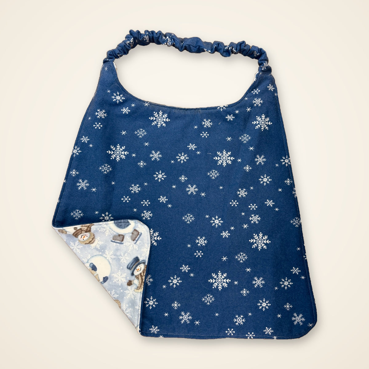 Skating Snowmen / Blue Snowflakes drool bib, snowflake side