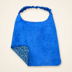 Blue Mosaic / Solid Blue drool bib, blue side