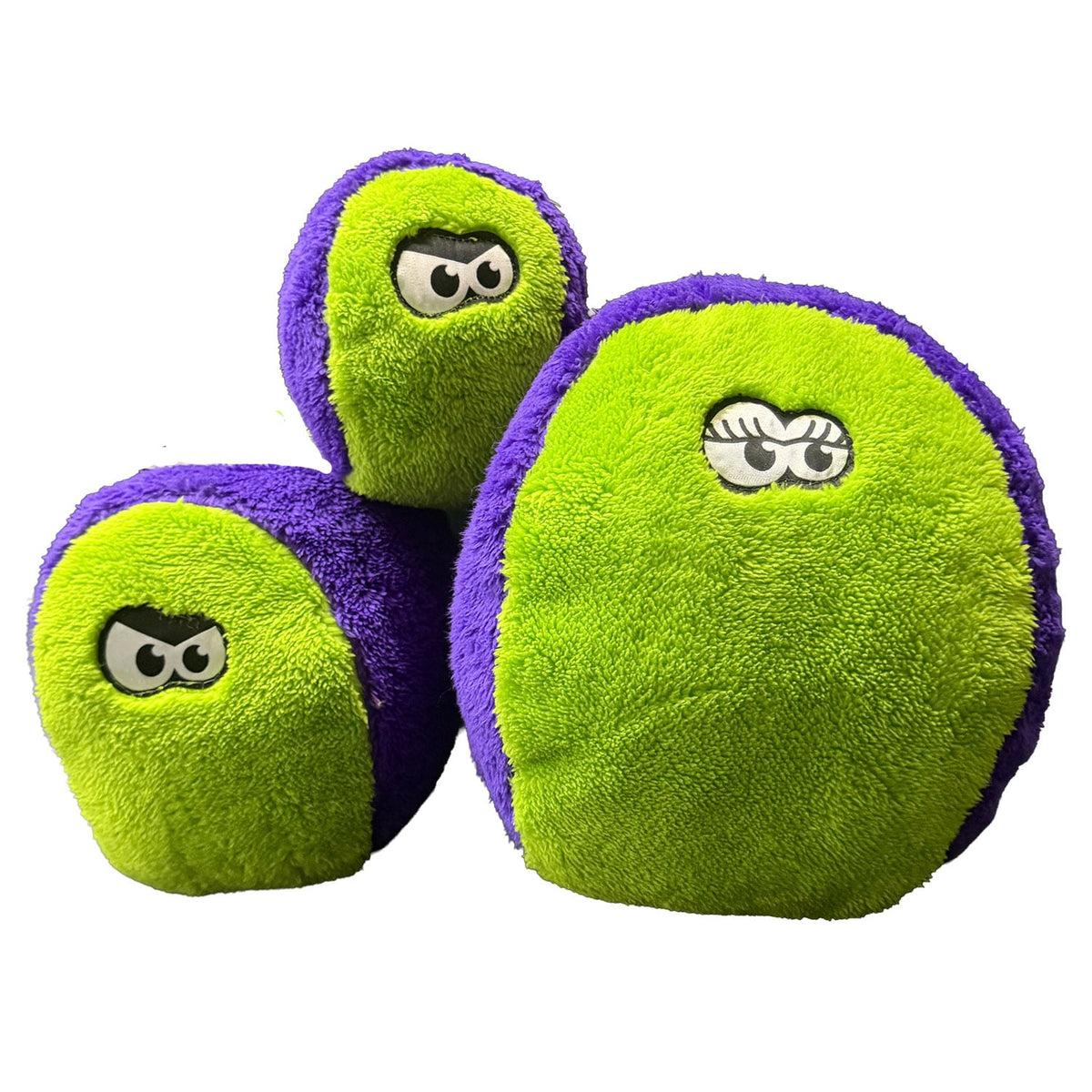 Cycle Dog Duraplush FuzzBall dog toys in purple and green, three sizes